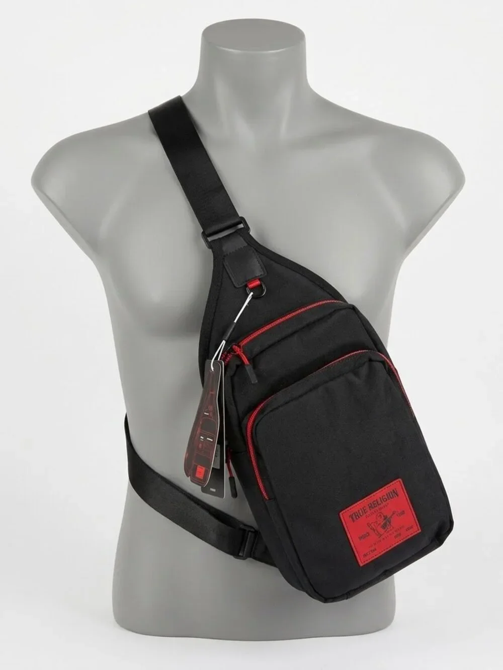 True Religion Sling Bag Features a Textured Brand Patch Durable Nylon With Red